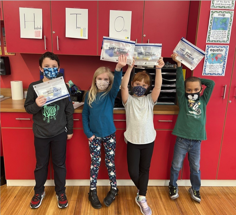 Milton Elementary students (l-r) Bryce Davis, Sara Walls, Rylee Blansfield and Jayden Brown received toothbrushing kits for National Children's Dental Health Month.